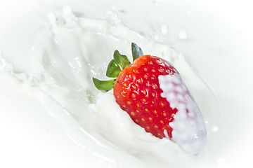 Image showing strawberry splashing into milk