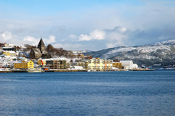 Image showing new modern architecture at frozen riverside in winter