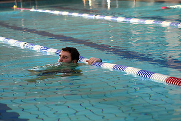 Image showing swimmer makes a break