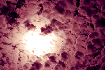 Image showing Pink clouds at the black sky