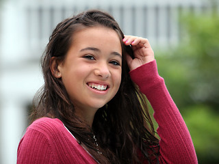 Image showing Happy asian teen girl  smiling