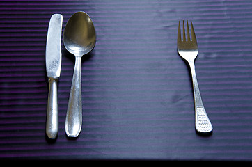 Image showing Retro metal tableware etiquette spoon fork knife 