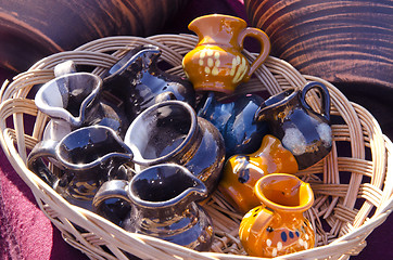 Image showing Decorative handmade pottery jar sold market fair 