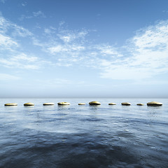 Image showing step stones in the blue sea