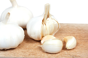 Image showing Fresh garlic on the wooden desk