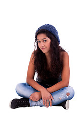 Image showing beautiful and happy woman sitting on the floor