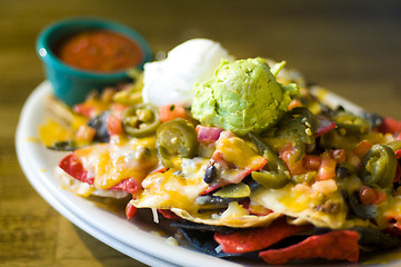 Image showing Nachos with cheese and guacamole