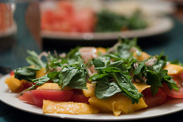 Image showing Green salad with mango and tomatoes