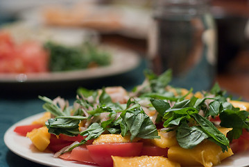 Image showing Green salad with mango and tomatoes