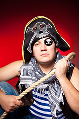Image showing one-eyed pirate with a cocked hat and a rope