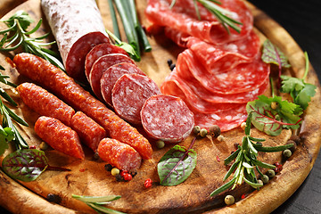 Image showing Italian ham and salami with herbs