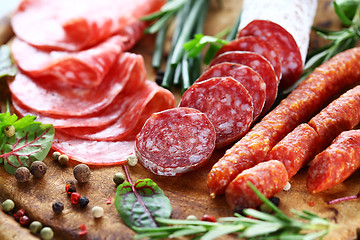 Image showing Italian ham and salami with herbs