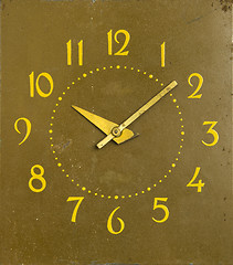 Image showing ancient mechanical clock arrows number of hours 