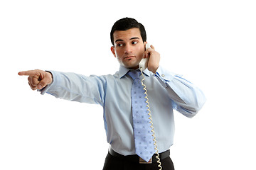 Image showing Businessman on telephone pointing