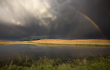 Image showing Hail Storm and Rainbow