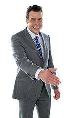 Image showing Confident modern businessman offering handshake