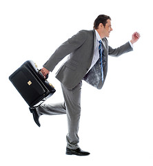 Image showing Businessman running with a briefcase