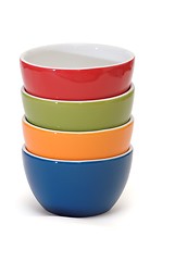 Image showing Stack of four porcelain bowls isolated