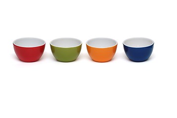 Image showing Row of four porcelain bowls isolated