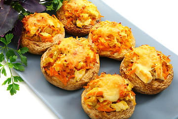 Image showing Mushrooms stuffed with vegetables and chicken.