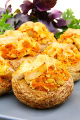 Image showing Mushrooms stuffed with vegetables and chicken.