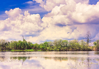 Image showing Clouds reflection on lake.