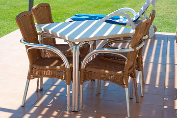 Image showing Chairs and table near apartments