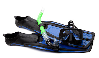 Image showing Mask, snorkel and flippers with water drops