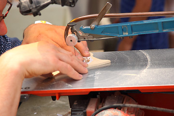 Image showing precise cutting of a wood panel for decoration