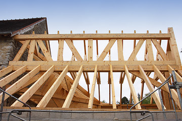 Image showing construction of the wooden frame of a roof