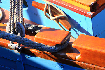 Image showing details of an old fishing boat sailing out of wood