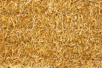 Image showing close-up of a stack of straw in the sun