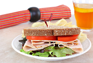 Image showing Healthy turkey sandwich on whole wheat bread.