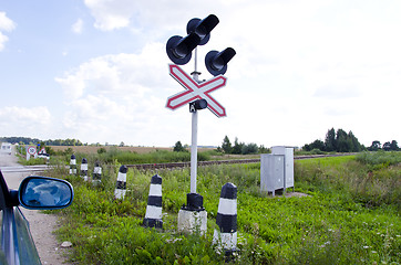 Image showing Car stand railway crossing road traffic-light 