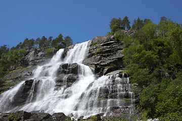 Image showing Big waterfall in a fjord it norvege in spring