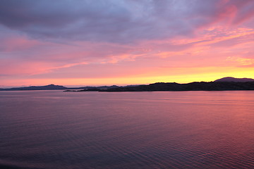 Image showing sunset view from a boat off the coast of norway