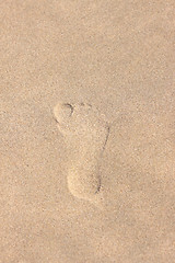 Image showing trace of a child's foot on the sand of the beach