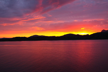 Image showing sunset view from a boat off the coast of norway