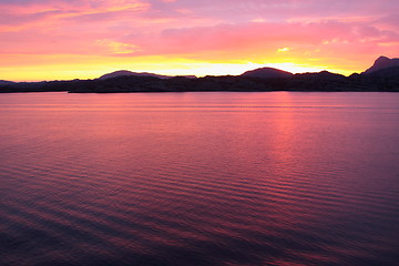 Image showing sunset view from a boat off the coast of norway