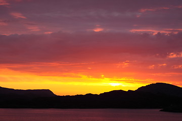 Image showing sunset view from a boat off the coast of norway