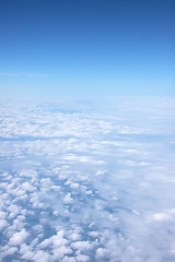 Image showing clouds and blue sky seen from plane