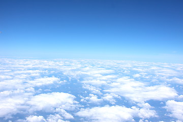 Image showing clouds and blue sky seen from plane