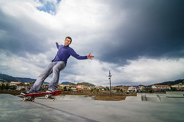 Image showing Skateboarder on a grind