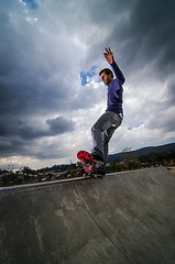 Image showing Skateboarder on a grind