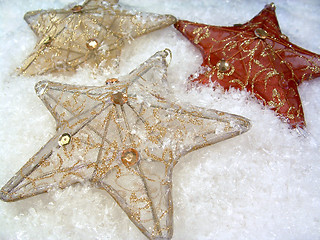 Image showing Three Stars on Snow