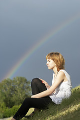 Image showing Attractive girl and rainbow