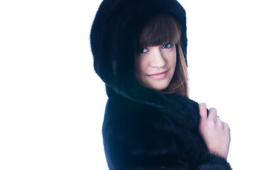 Image showing Young woman in fur coat