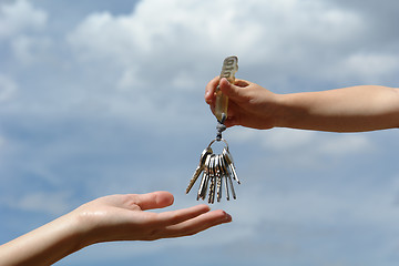 Image showing child's hand with keys