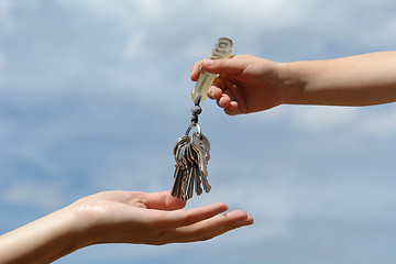 Image showing child's hand with keys