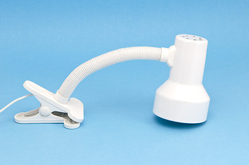 Image showing white desk lamp attachable object isolated on blue 